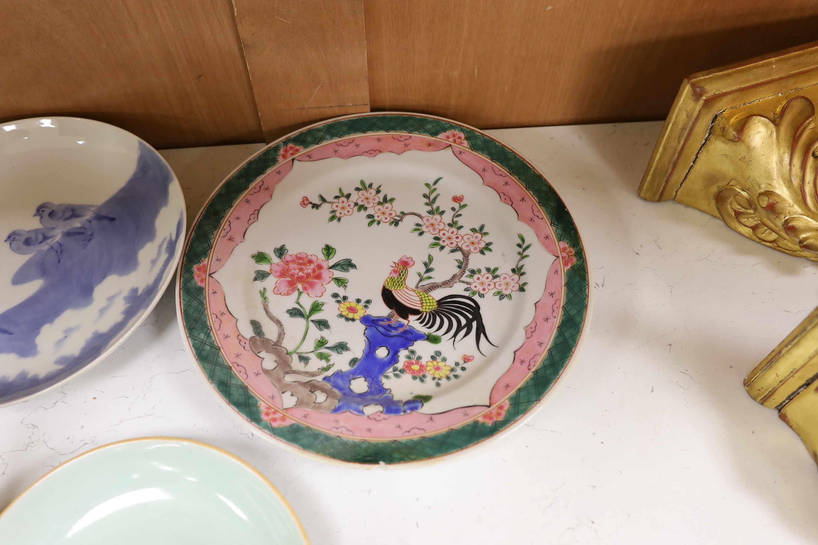 A group of Chinese plates and dishes including a Ming dynasty blue and white bowl